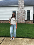 O striped taupe detailed blouse